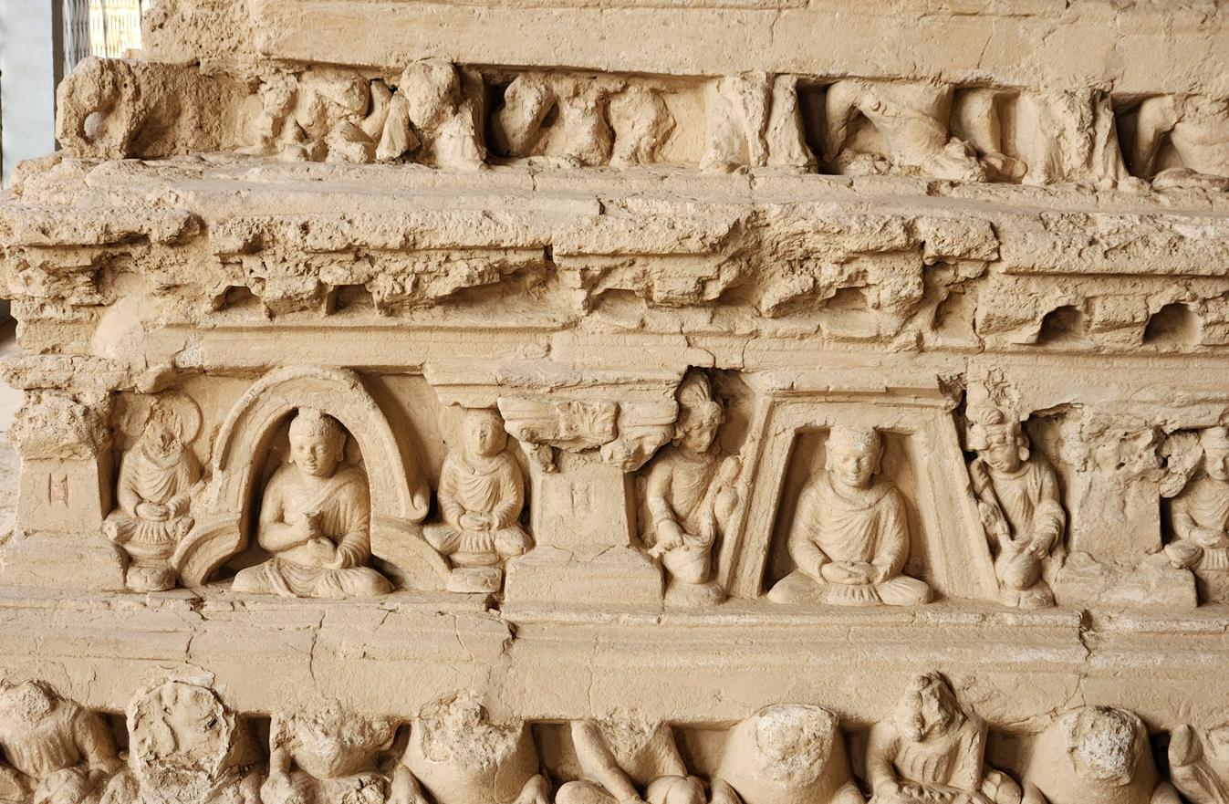 Stone carvings on base